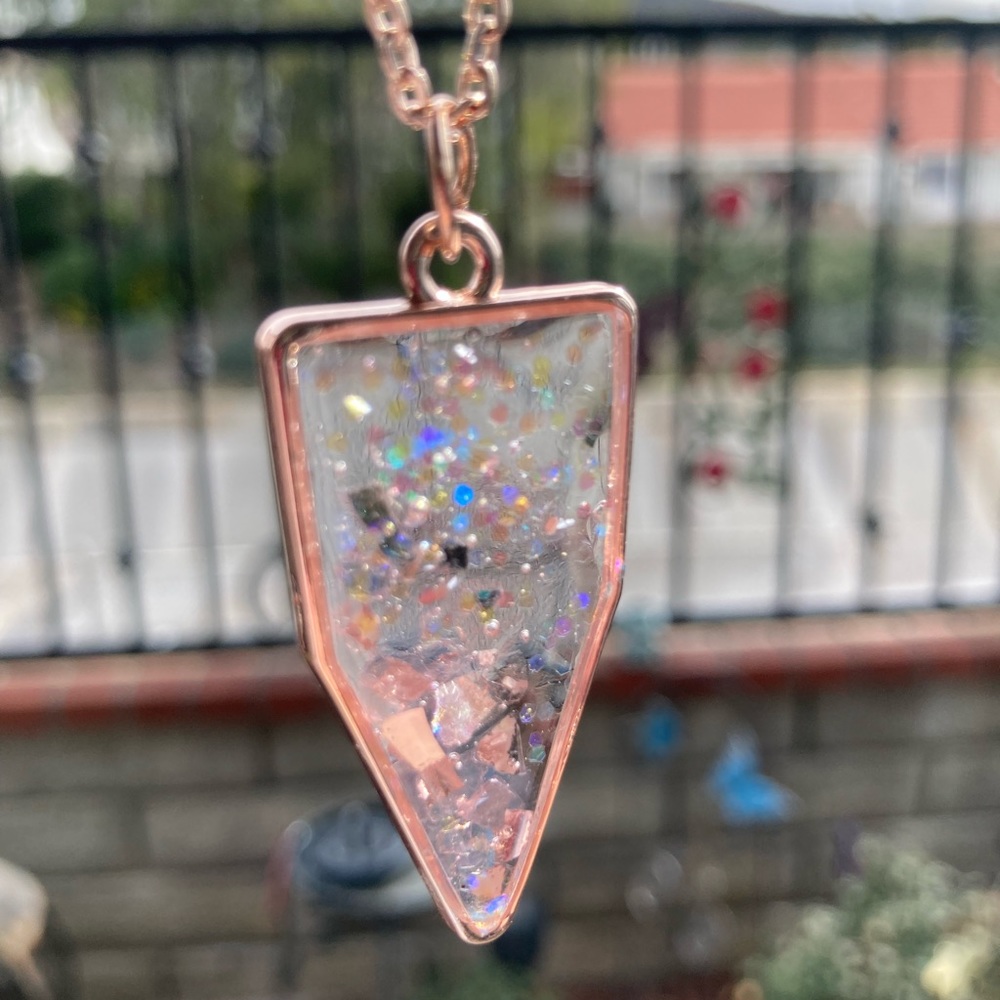 Rose gold necklace.